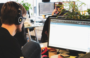 Interpreter Resources, siting at the desk